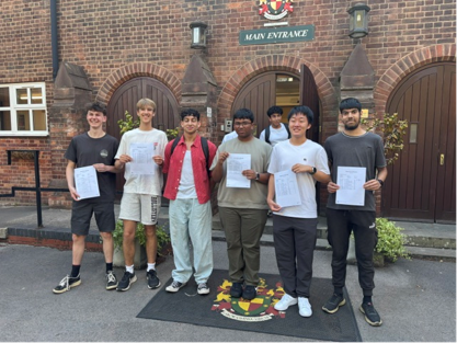 Students with their GCSE results