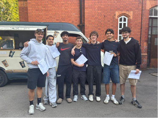 Students with their GCSE results